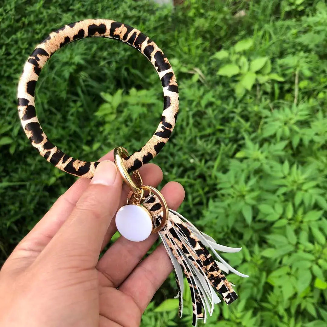 Bracelet pendentif pompon en cuir pur