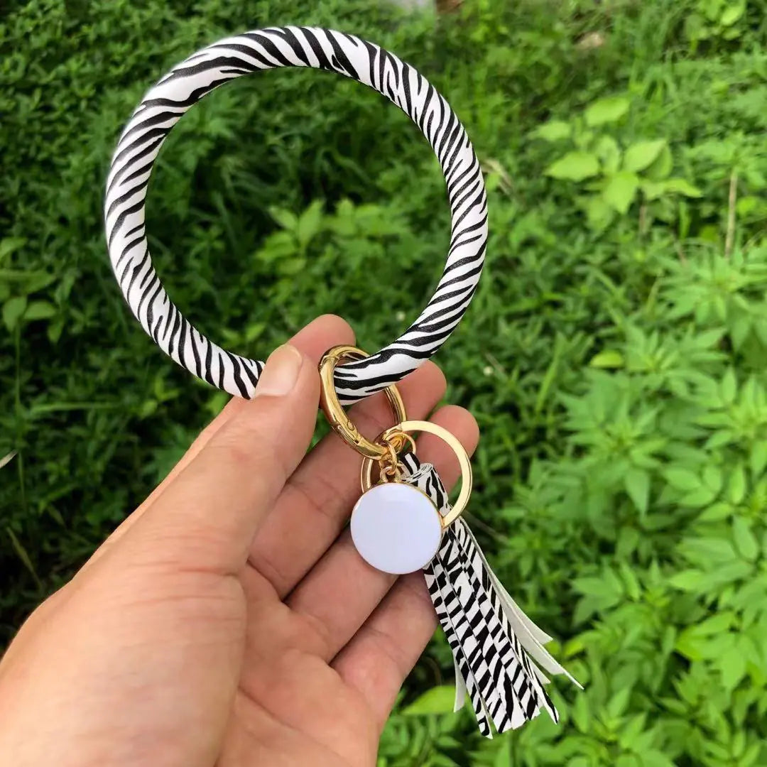 Bracelet pendentif pompon en cuir pur
