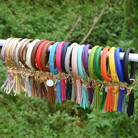 Bracelet pendentif pompon en cuir pur