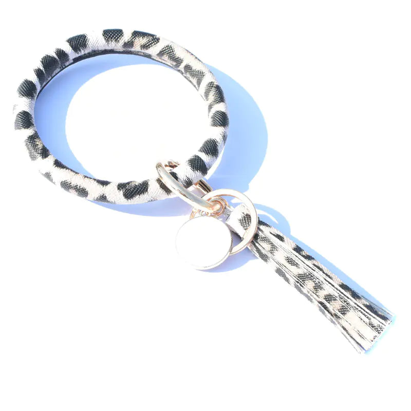 Bracelet pendentif pompon en cuir pur
