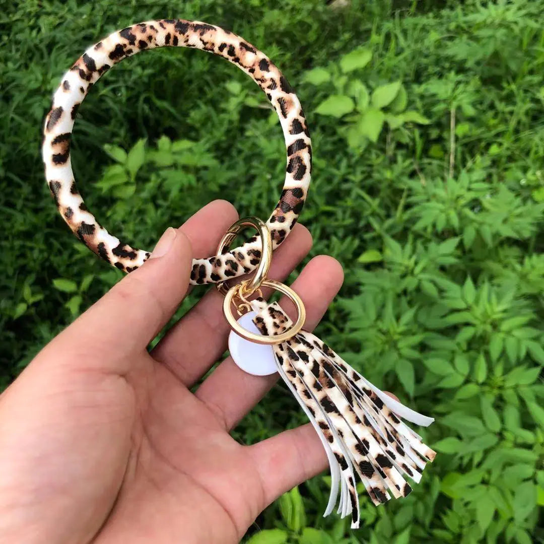 Bracelet pendentif pompon en cuir pur